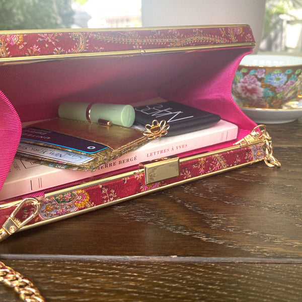 Regal Rouge' box clutch hand crafted from upcycled silk. Made in